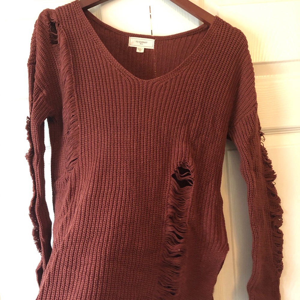 Burnt orange sweater.